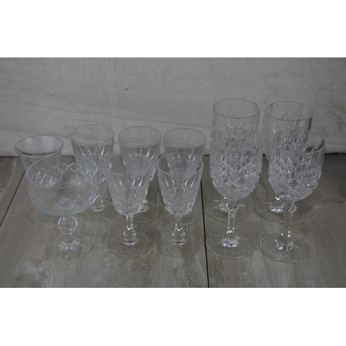 669 - A collection of wine glasses.