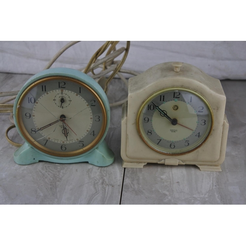 680 - A vintage Smiths Sectric mantle clock and another.