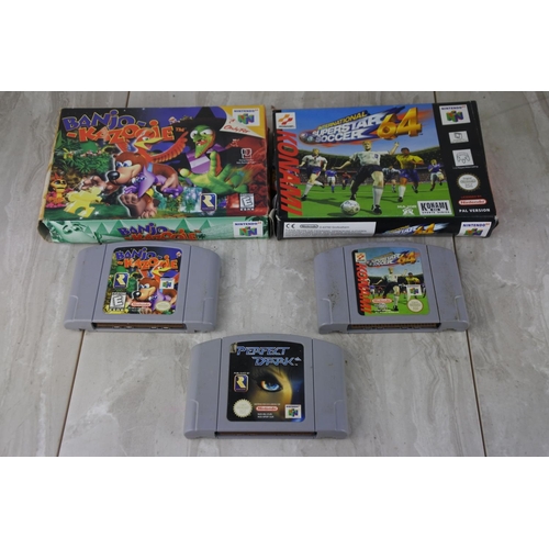 696 - Two boxed Nintendo 64 cartridges 'Banjo - Kazooie' and 'Konami - International Superstar Soccer' and... 