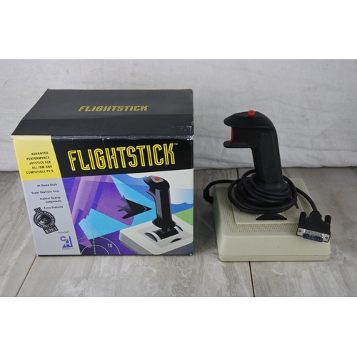 699 - A boxed Flightstick.