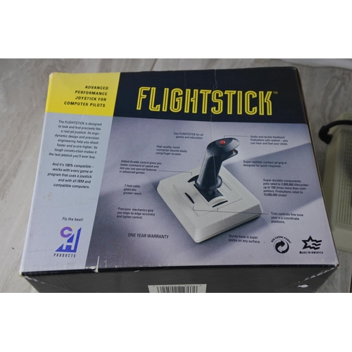 699 - A boxed Flightstick.