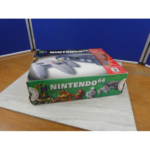 703 - A boxed Nintendo 64 console and controller.