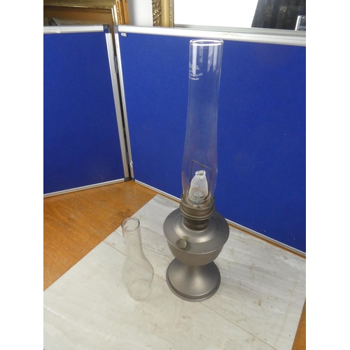 713 - A vintage Aladdin No21 oil lamp and a spare oil lamp funnel. Approx 60cm.