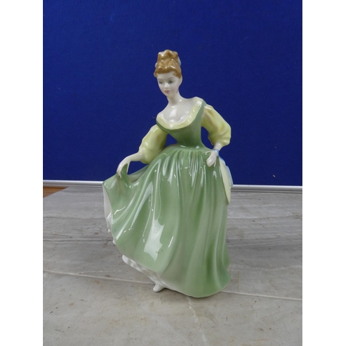 717 - A Royal Doulton figurine 'Fair Lady' HN2193