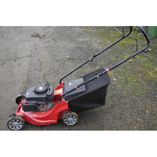 1256 - A petrol lawn-mower.