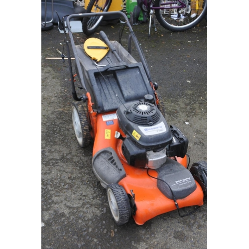 1264 - A Honda petrol Lawnmower.