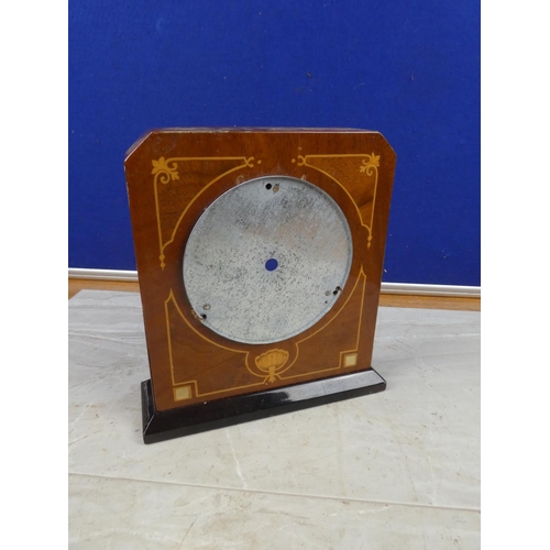 130 - An inlay and mother of pearl clock case.
