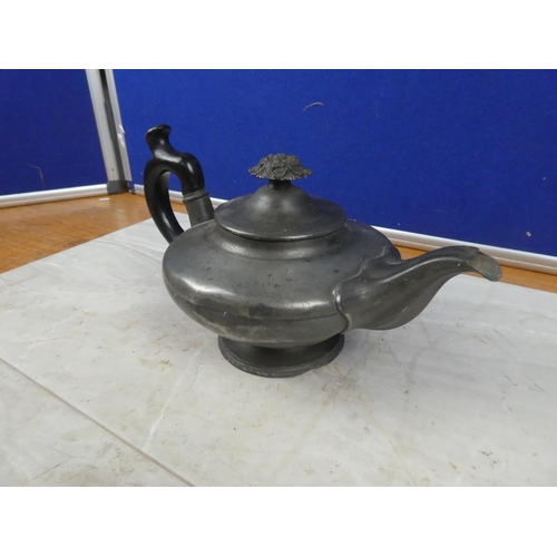 136 - An antique pewter teapot by Dixon & Sons.