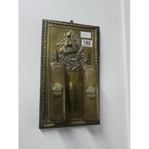195 - A vintage brass wall mounted brush set with ship design. Approx 36x20cm.