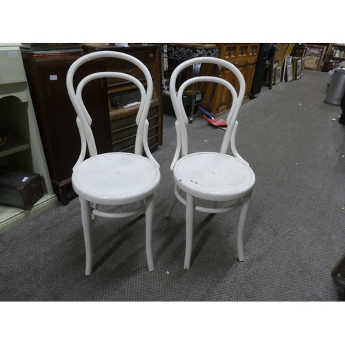 1147 - A pair of upcycled wooden dining chairs.