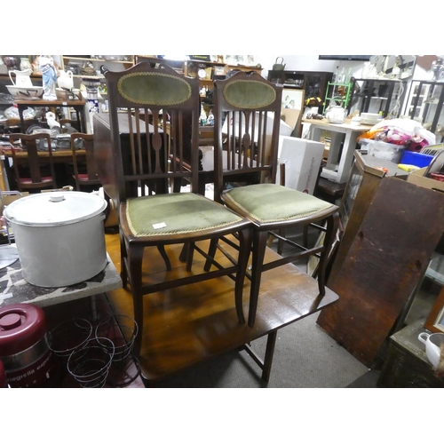 1148 - A pair of beautifully upholstered antique dining chairs with fine gold details.