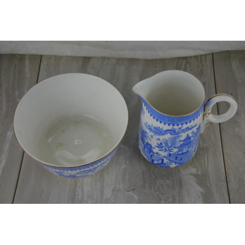 15 - An antique Royal Worcester jug and bowl set.