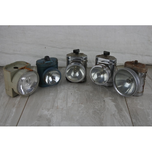 31 - Three vintage Pifco bicycle lights and two others.