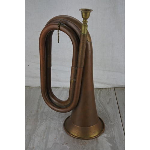 43 - An antique copper and brass bugle.