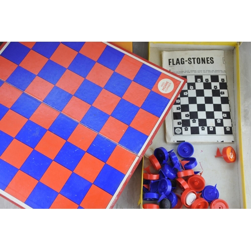 47 - A boxed drinking roulette set and a Flag & Stones boxed game (a/f).