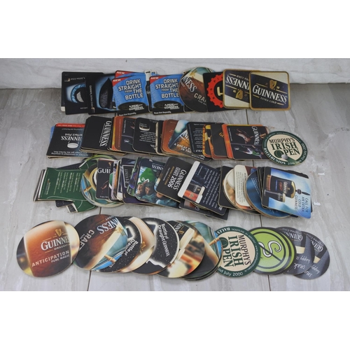 48 - A lot of vintage Guinness coasters.
