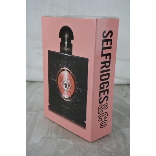 6 - A new boxed Yves Saint Laurent Black Opium perfume.
