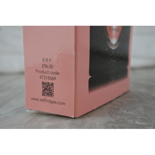 6 - A new boxed Yves Saint Laurent Black Opium perfume.