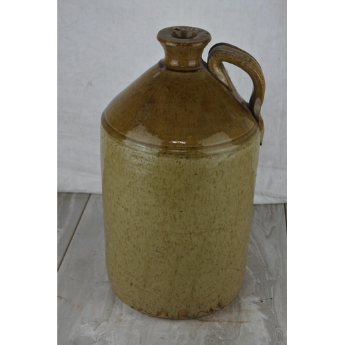 64 - An antique stoneware flagon (a/f). Approx 32cm.