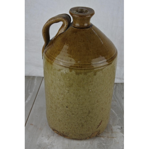 64 - An antique stoneware flagon (a/f). Approx 32cm.