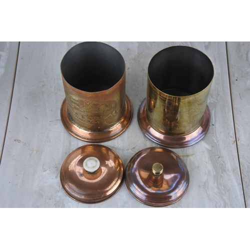 65 - Two vintage copper and brass tea caddies.