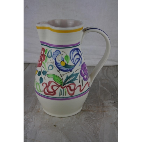 70 - A vintage Poole pottery jug. Approx 19cm.