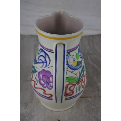 70 - A vintage Poole pottery jug. Approx 19cm.