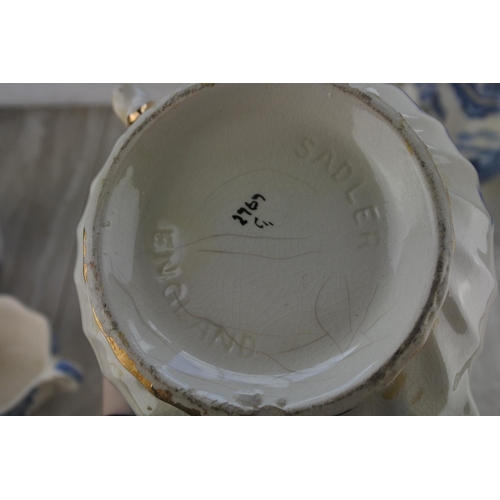 259 - A collection of blue and white ware pottery.