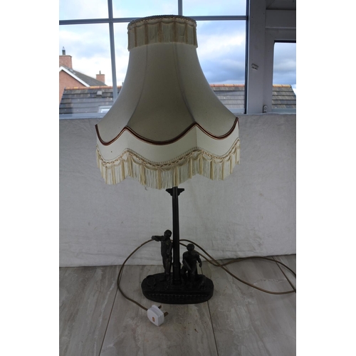 265 - A stunning figurine based table lamp and shade (a/f).  Approx 80cm.
