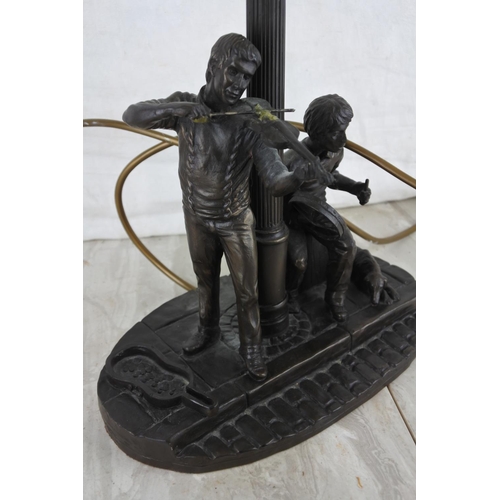 265 - A stunning figurine based table lamp and shade (a/f).  Approx 80cm.