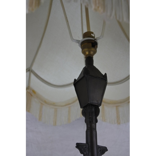 265 - A stunning figurine based table lamp and shade (a/f).  Approx 80cm.