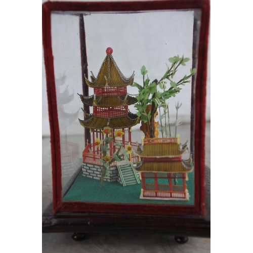 273 - Two stunning Oriental houses in glass presentation cases.