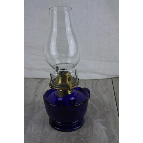 275 - A stunning Bristol blue finger lamp and shade.