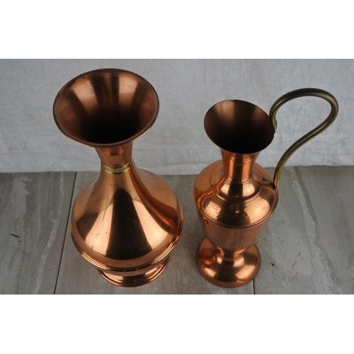 293 - A large copper jug and vase.  Approx 33cm.