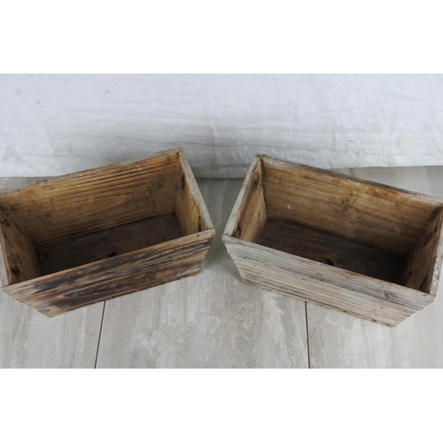 294 - Two small wooden planters.