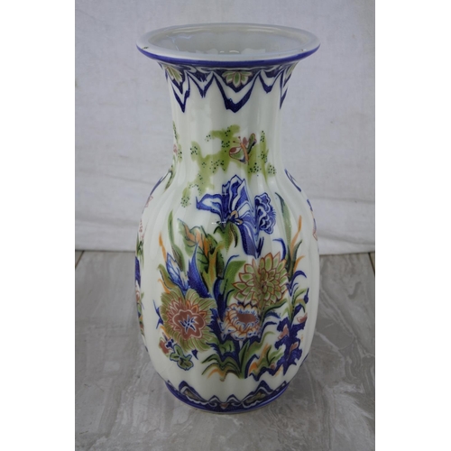 594 - A decorative Remy Floral vase.