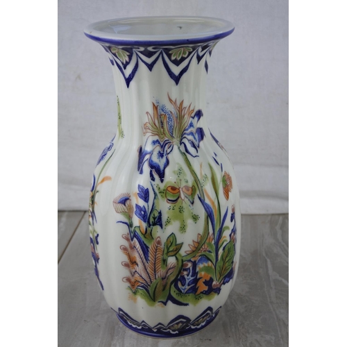 594 - A decorative Remy Floral vase.