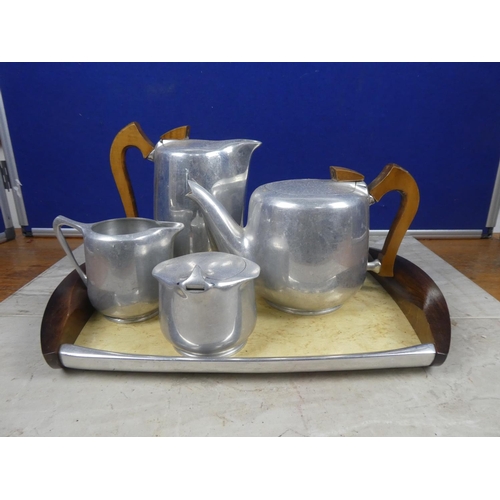 608 - A vintage Picquot Ware tea/coffee set and tray.