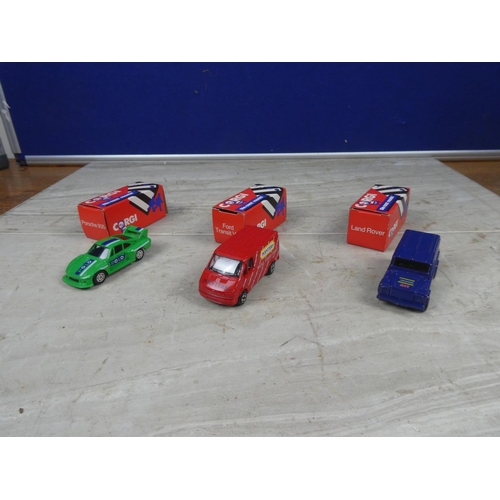 615 - Three boxed Corgi cars.
