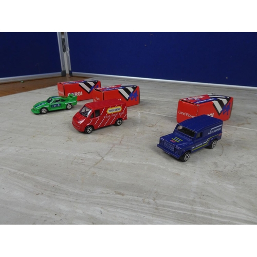 615 - Three boxed Corgi cars.