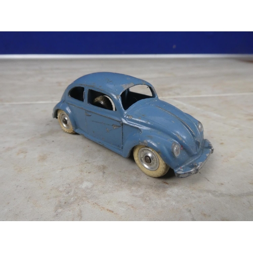 617 - A vintage Dinky toy car and a vintage Corgi Volkswagen.