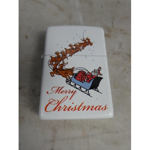 621 - A Zippo Merry Christmas lighter.
