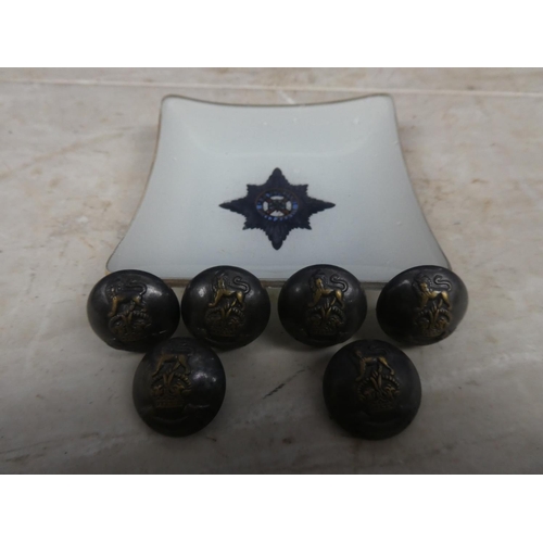 630 - Six military buttons and a glass dish.