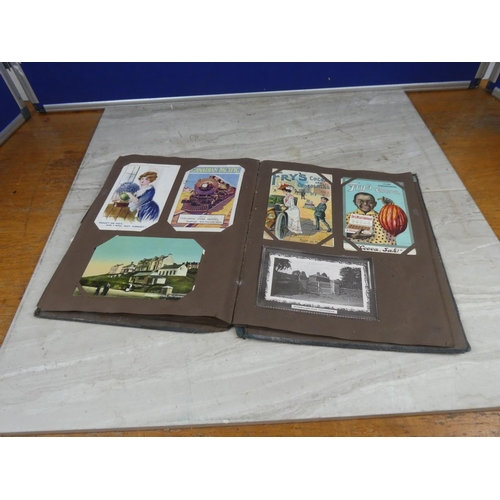 634 - A vintage postcard album and a lot of postcards to include Military, White Star Line, Cunard & other... 