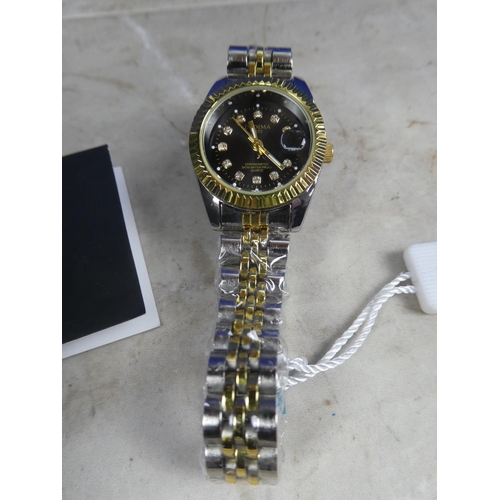 640 - A ladies Kingnuos wrist watch.