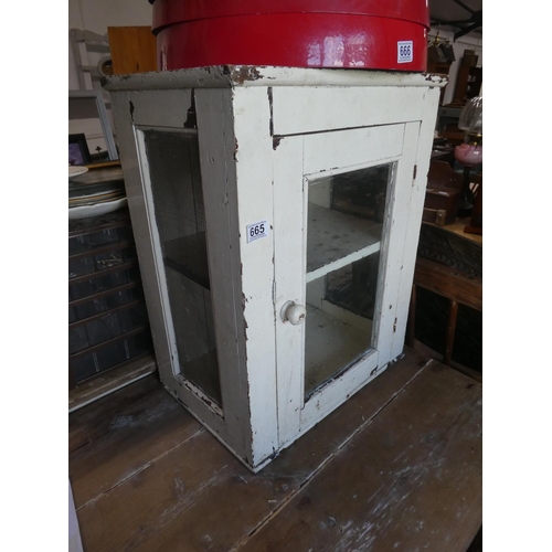 665 - An antique pine meat safe with glass panel door.