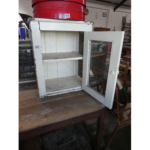 665 - An antique pine meat safe with glass panel door.