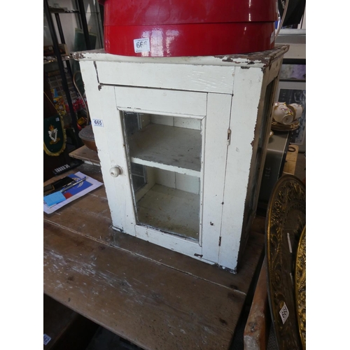 665 - An antique pine meat safe with glass panel door.