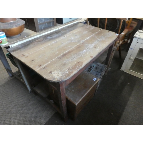 667 - An antique Irish pine kitchen table.