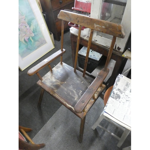 669 - A vintage reproduction of an antique Irish hedge/ Famine chair.